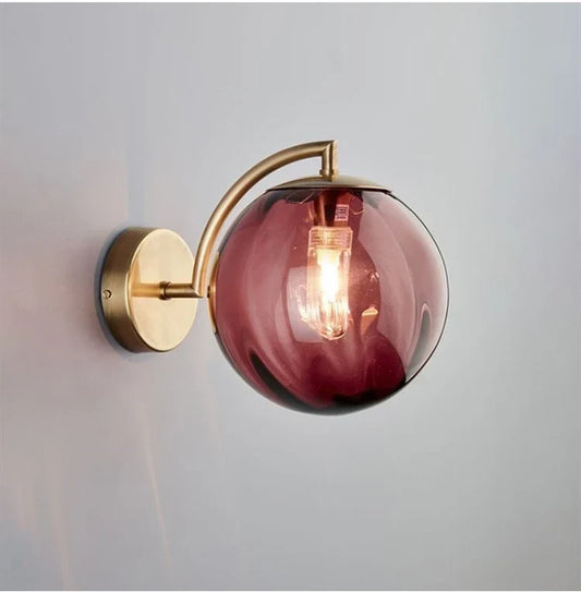 Modern Glass Ball Wall Lamp with Brass Finish and Tinted Glass