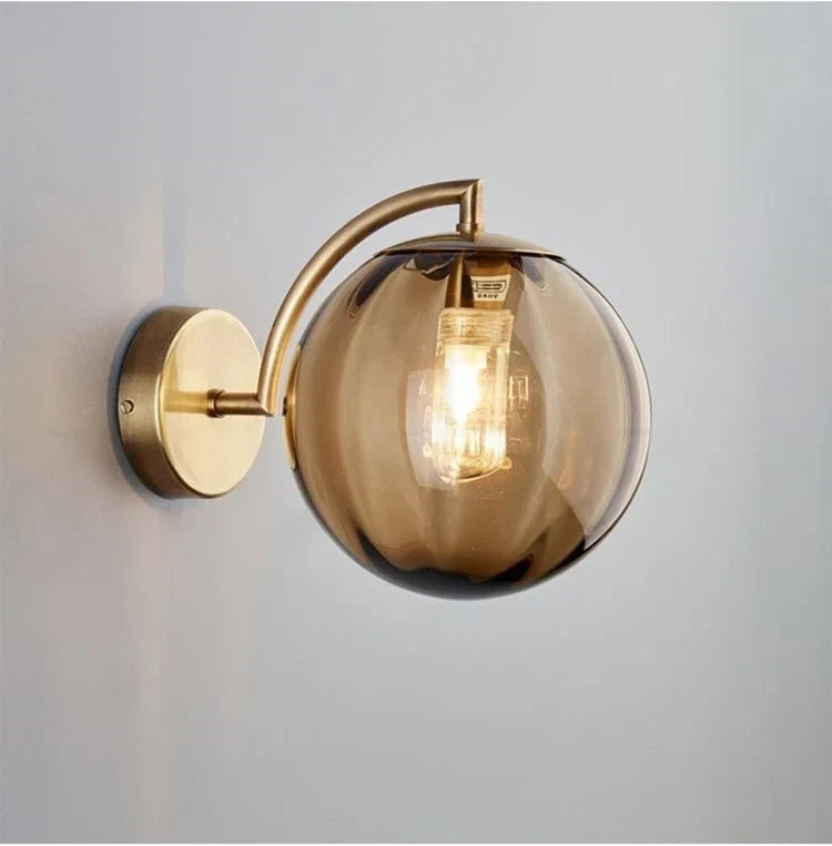 Modern Glass Ball Wall Lamp with Brass Finish and Tinted Glass