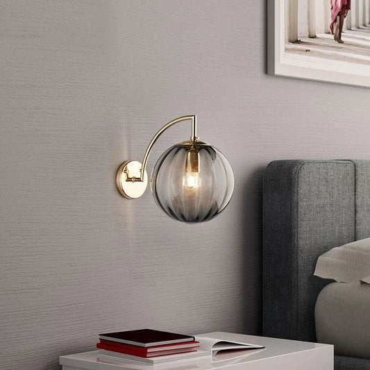 Modern Glass Ball Wall Lamp with Brass Finish and Tinted Glass