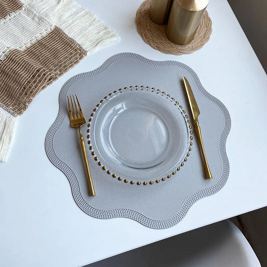 FloraMat Luxury Round Faux Leather Placemats with Embossed Flower Design